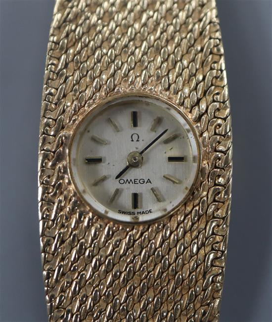 A ladys 1960s 9ct Omega manual back wind bracelet watch, approx. 17cm.